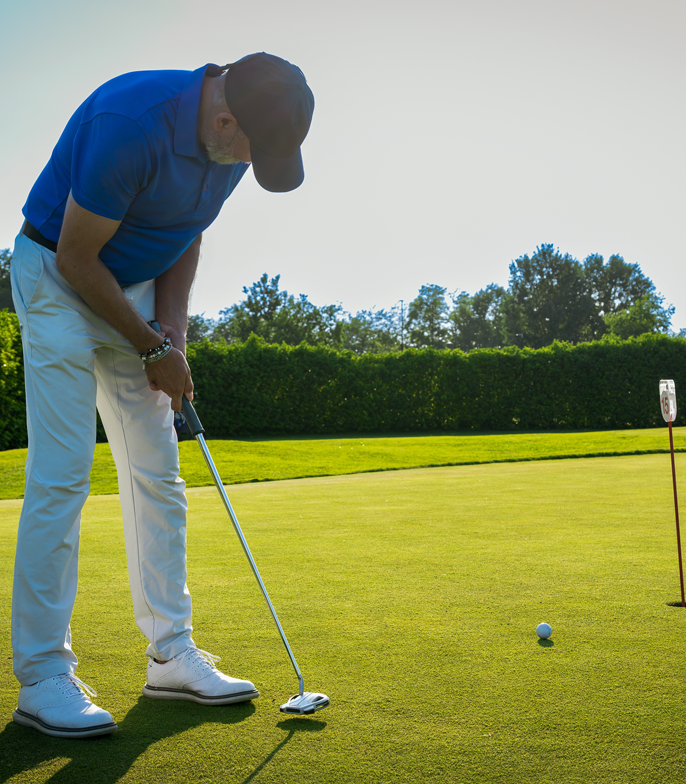 A person playing golf